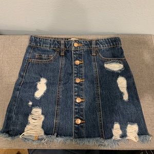 Blue distressed denim skirt